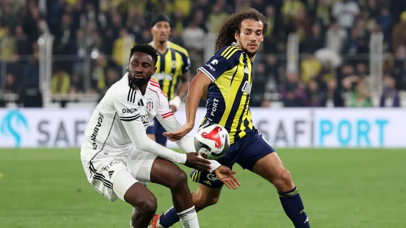 Vilfred Endidi u duelu sa Mateom Genduzijem (©Reuters)