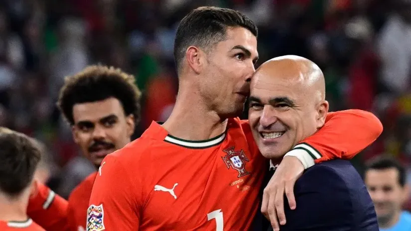 Kristijano Ronaldo i Roberto Martines (©AFP)