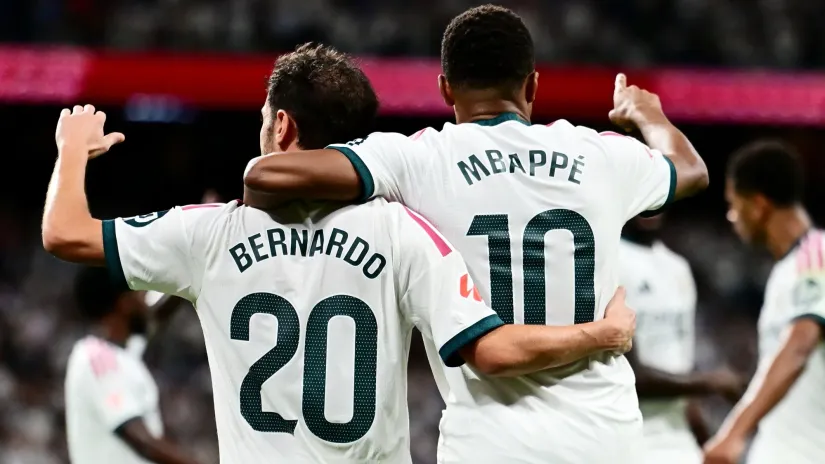 Bernardo Silva i Kilijan Embape (©Reuters)