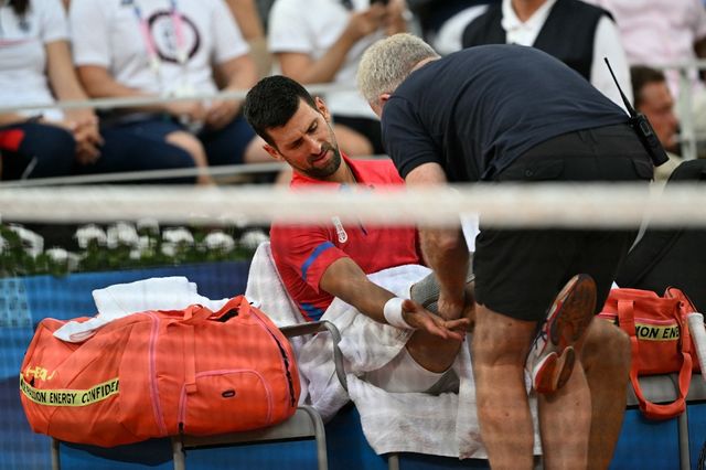 Novak sa fiziom (AFP)