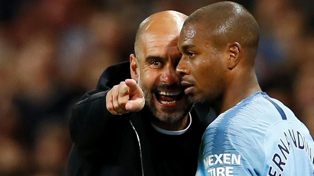 Pep Gvardiola i Fernandinjo (©Reuters)