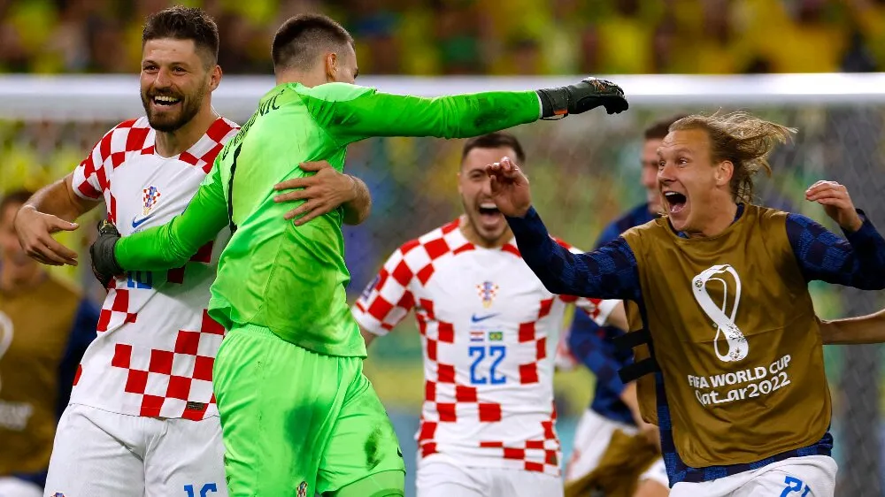 ©Reuters (Slavlje igrača Hrvatske posle pobede nad Brazilom 2022)