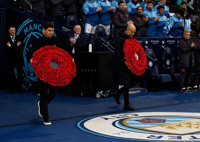 Andoni Iraola i Pep Gvardiola (©Reuters)