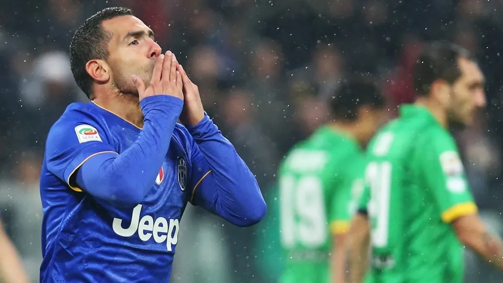 Karlos Teves u dresu Juventus protiv Parme 2014. godine (©AFP)
