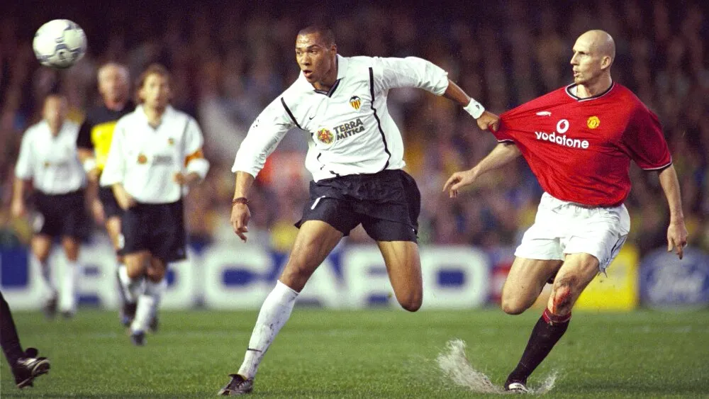 Džon Kerju i Jap Stam (©Reuters)